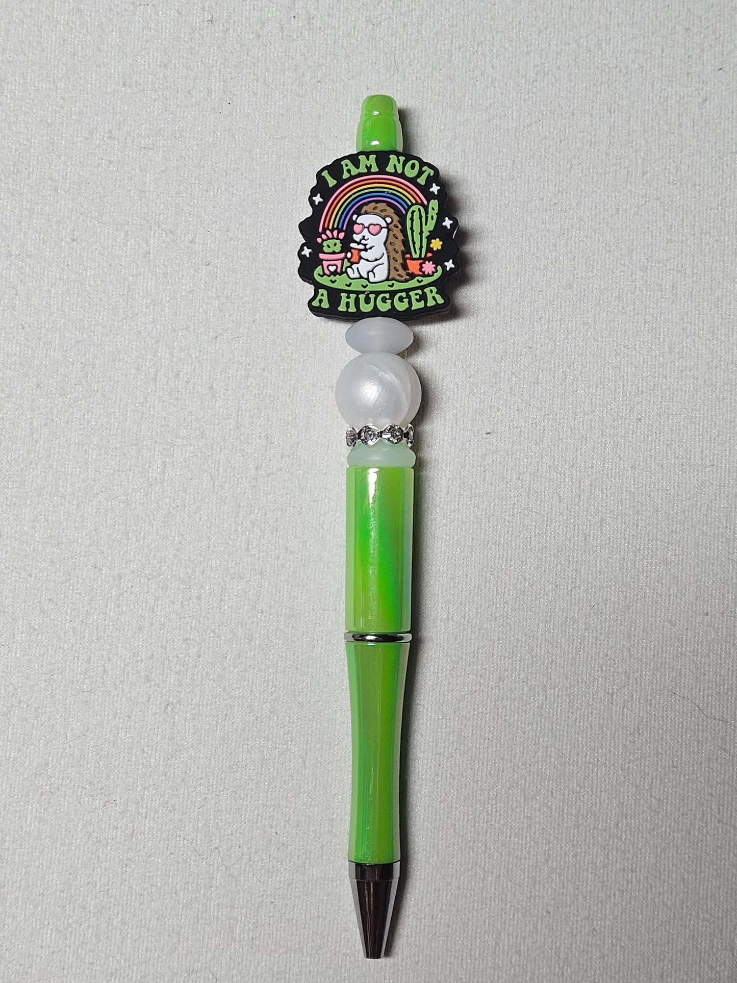 Beaded not a hugger green iridescent plastic pen