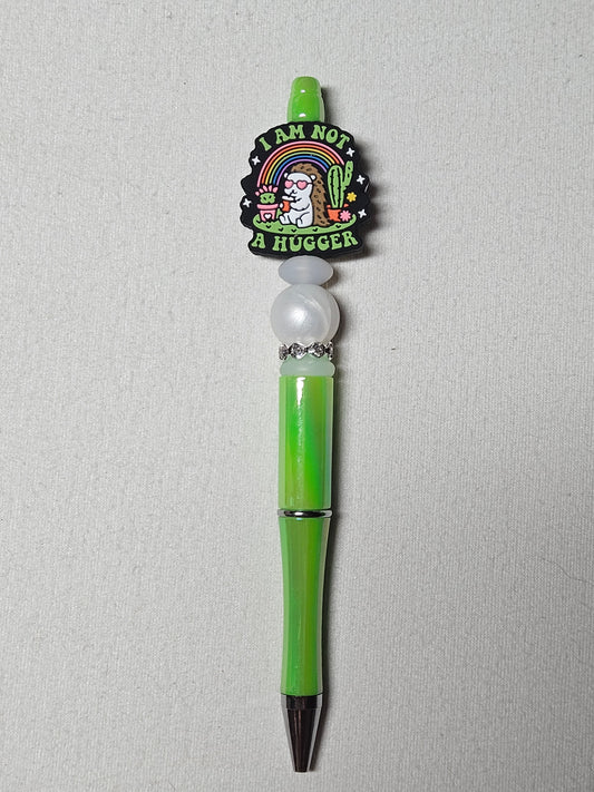 Beaded not a hugger green iridescent plastic pen