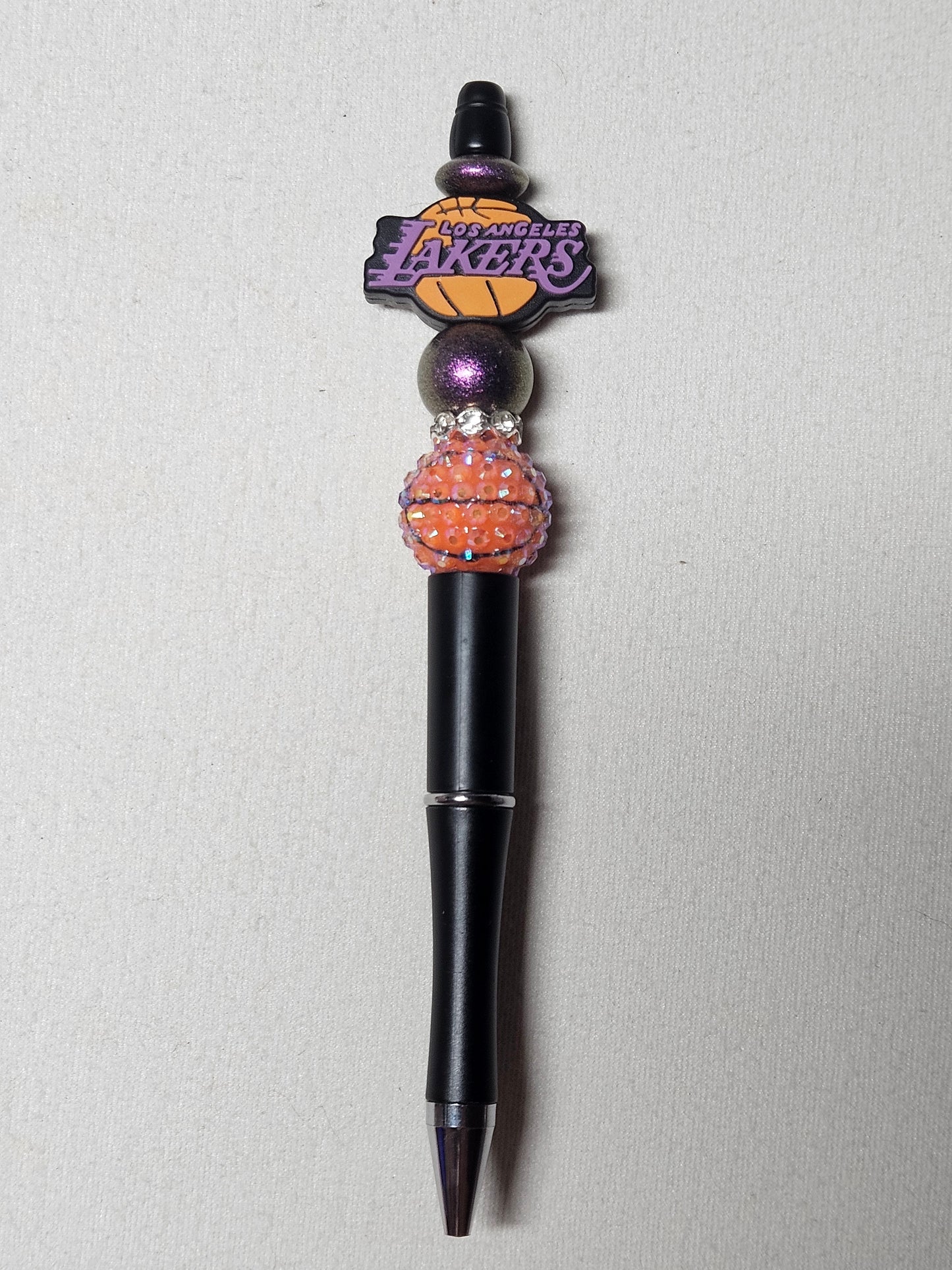 Beaded lakers black plastic pen