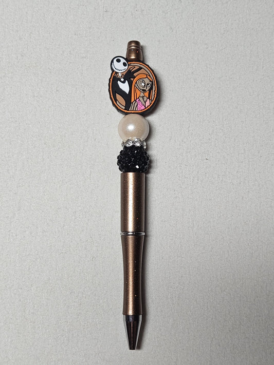 Beaded jack and sally gold plastic pen