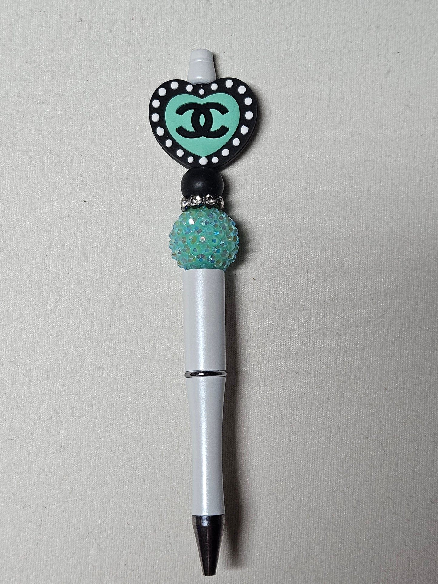 Beaded CiC green and white plastic pen