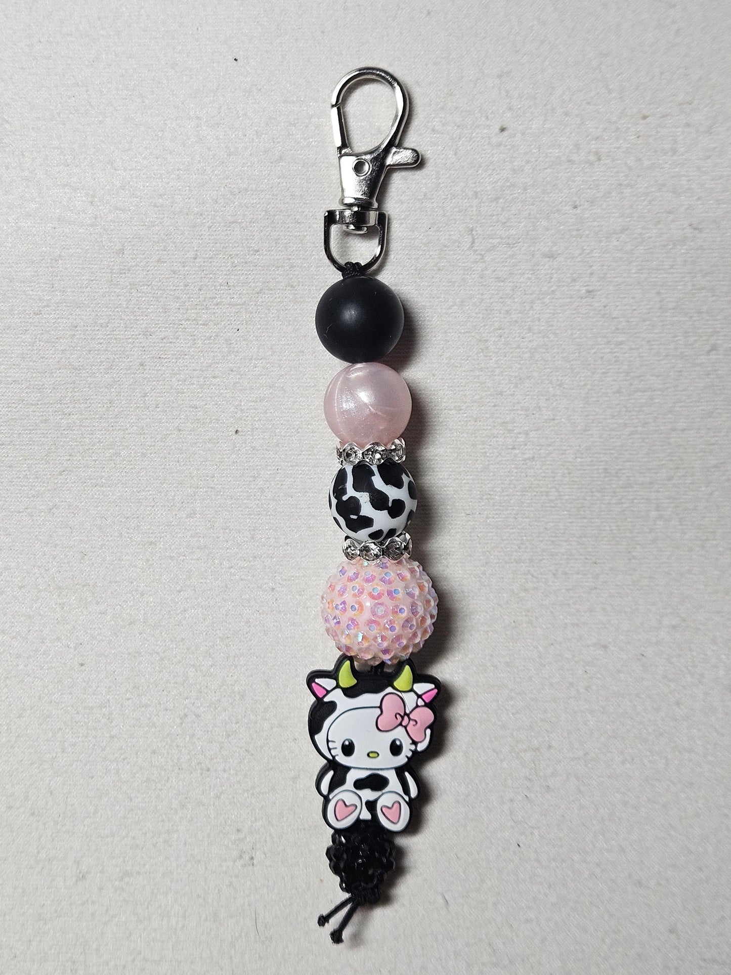 Beaded cow hello kitty keychain