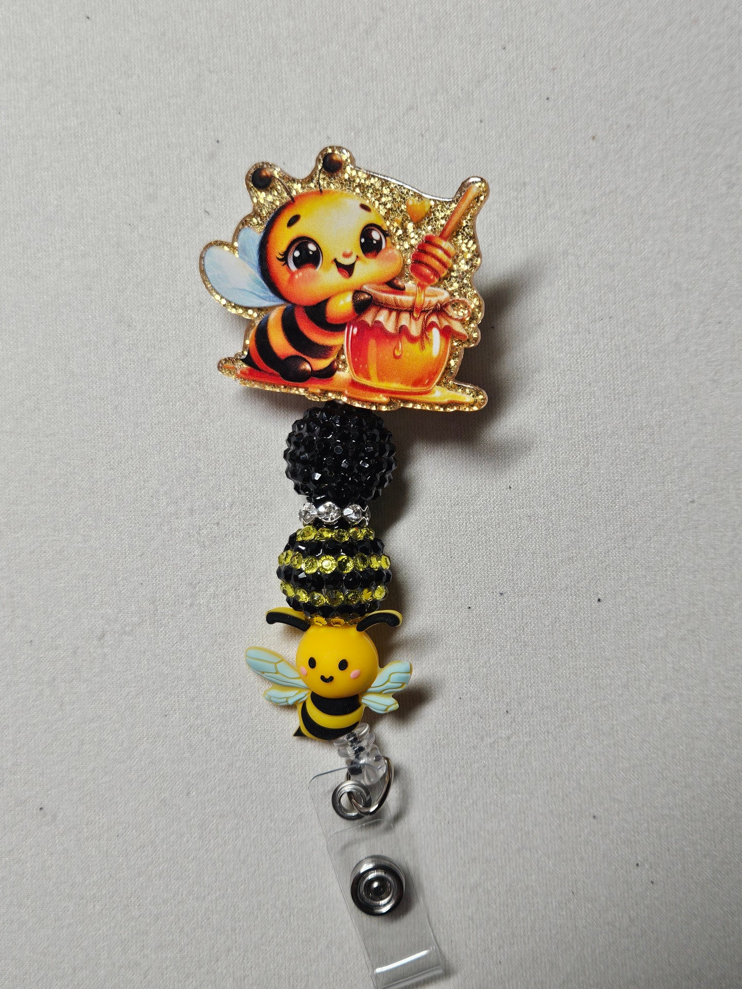 Bumble bee badge reel