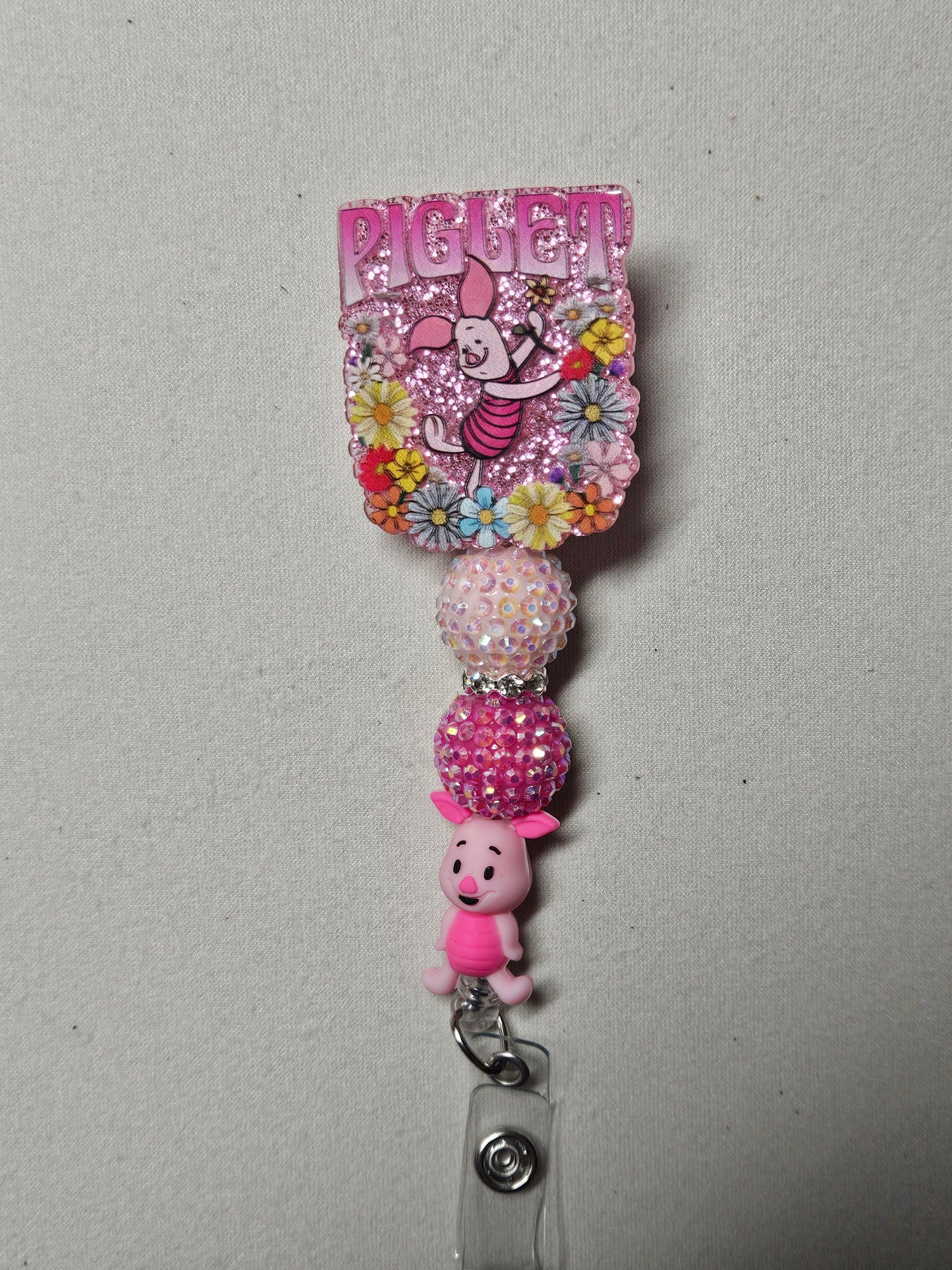 Piglet badge reel