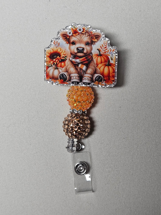 Fall cow badge reel