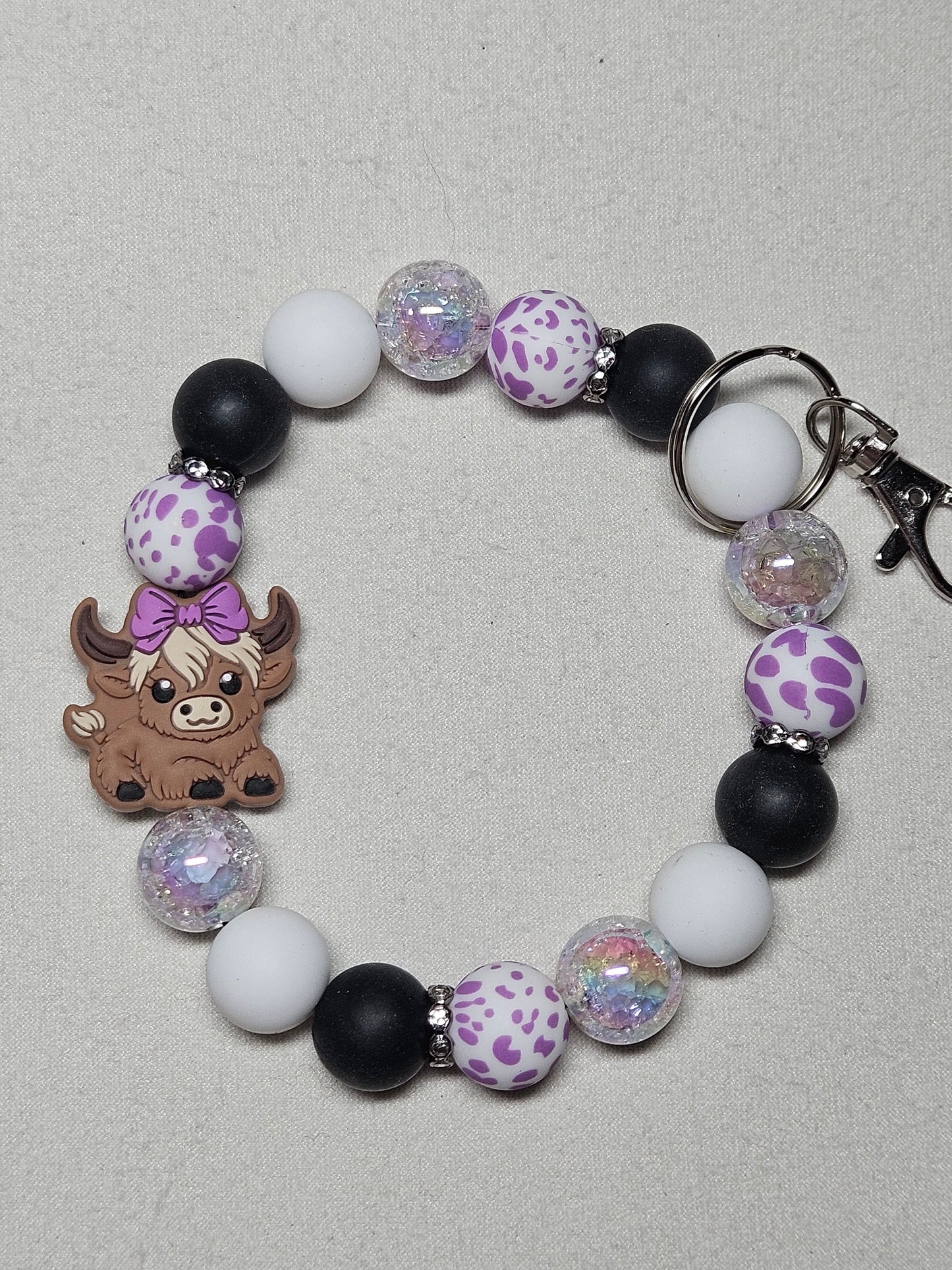 Beaded silicone purple cow keychain wristlet