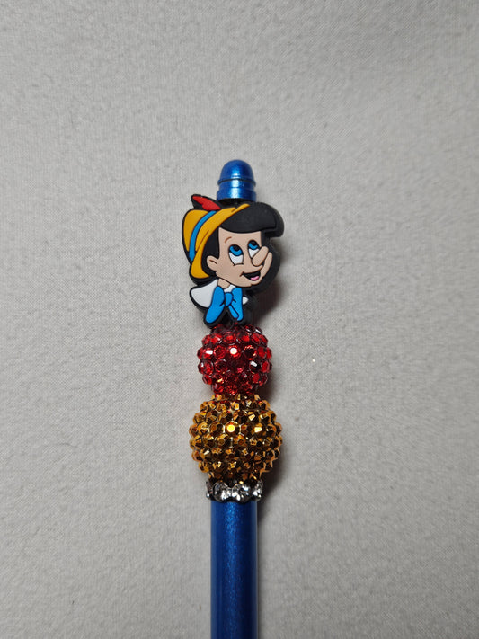 Beaded blue metal Pinocchio pen