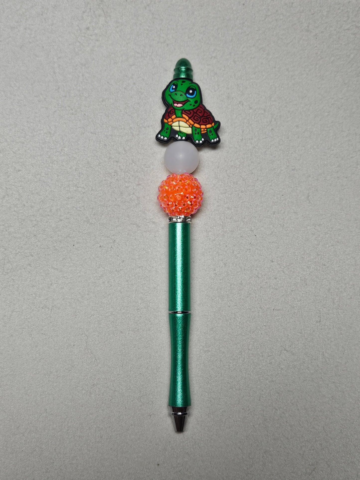 Beaded green turtle green metal pen