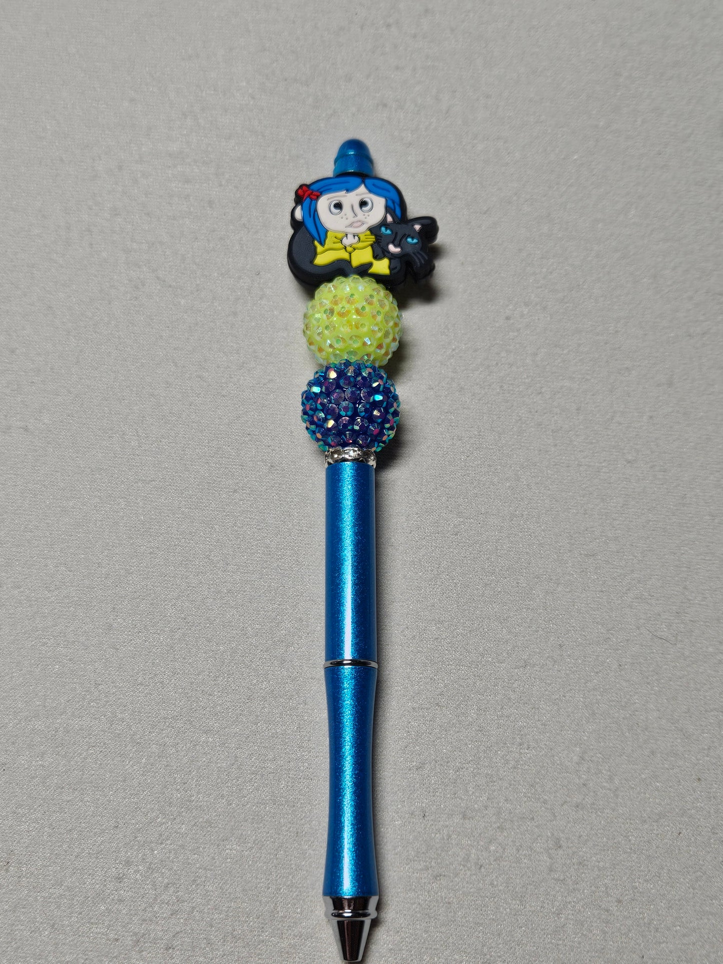 Beaded coraline blue metal pen