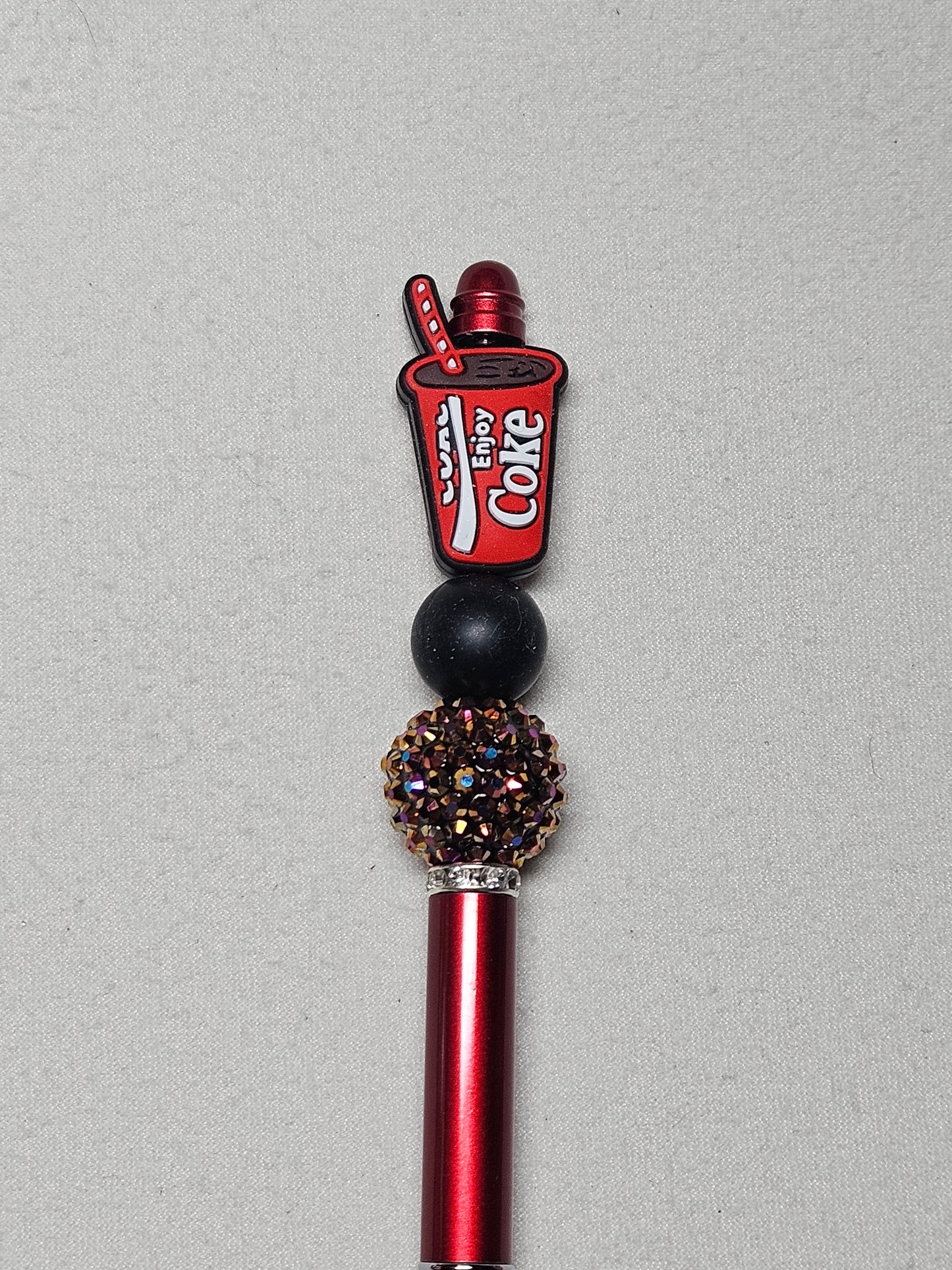 Beaded coke red metal pen