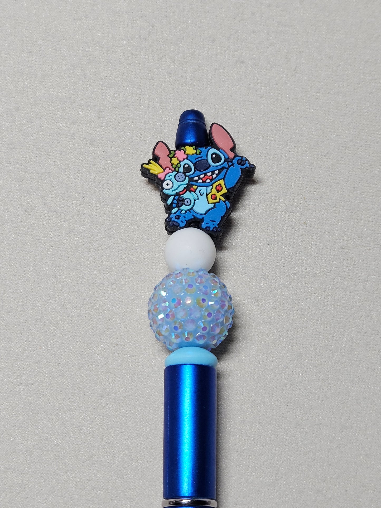 Beaded stitch blue plastic pen