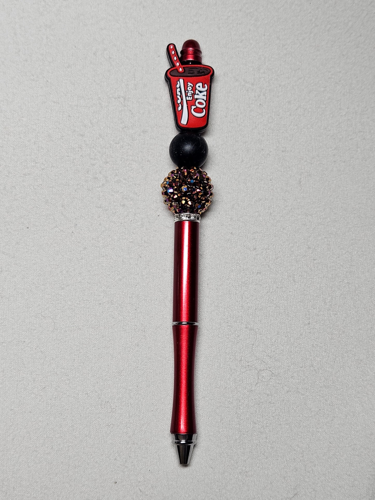 Beaded coke red metal pen