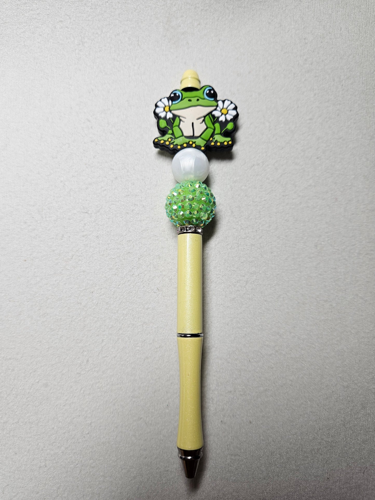 Beaded yellow metal frog pen