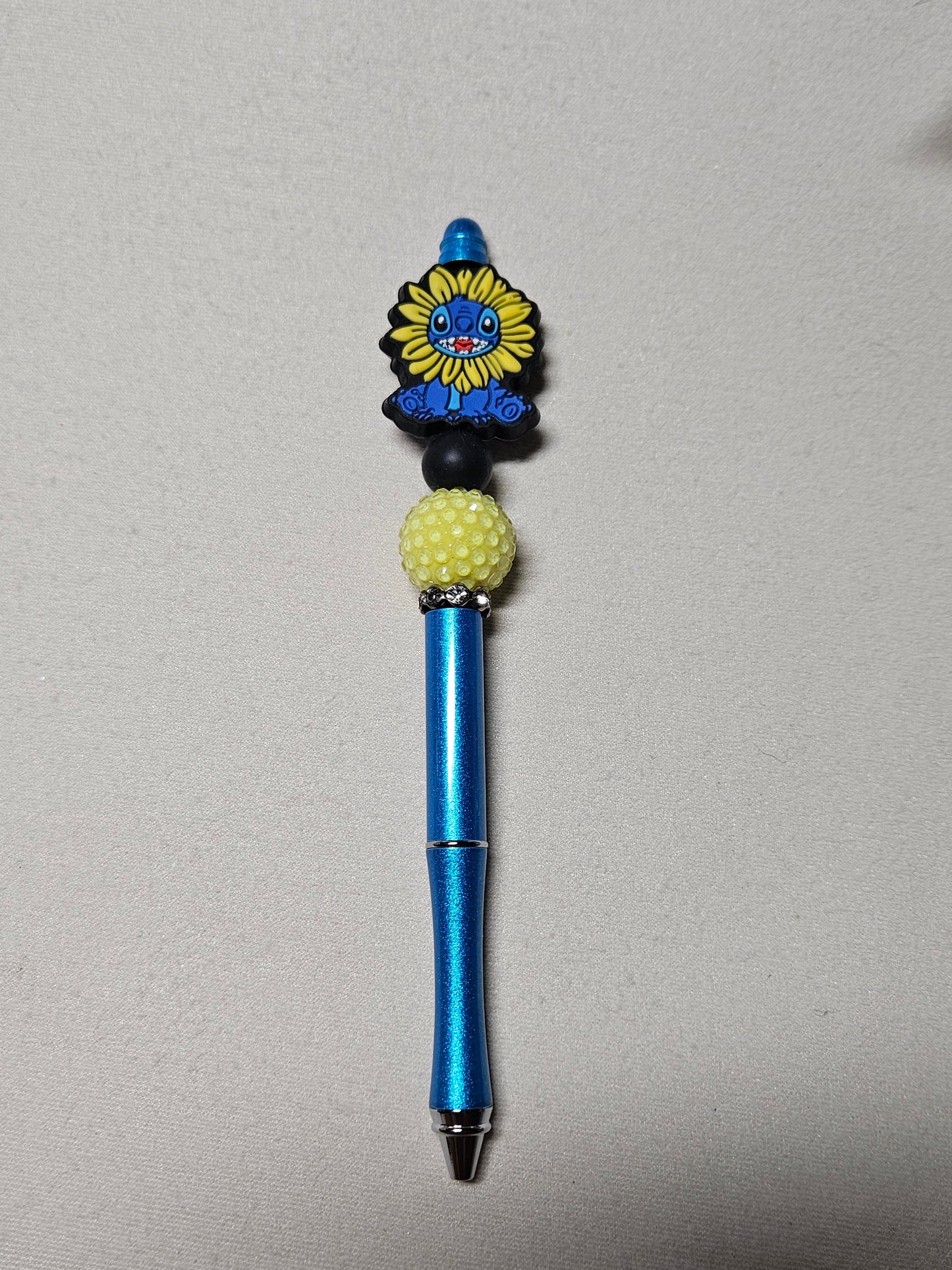 Beaded sunflower stitch blue metal pen