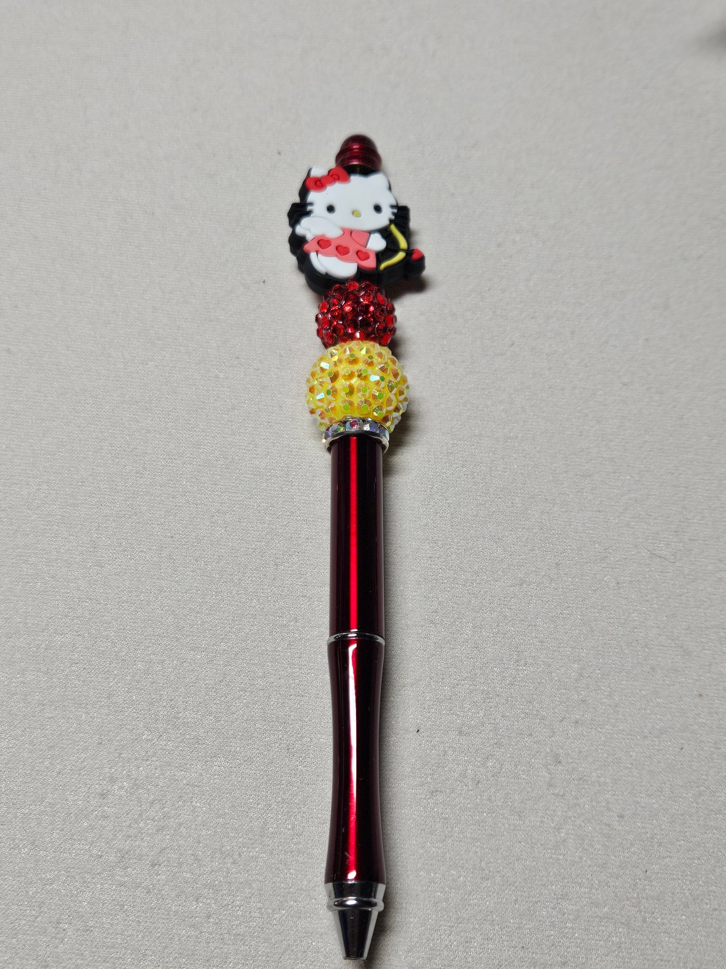 Beaded cupid HK red metal pen