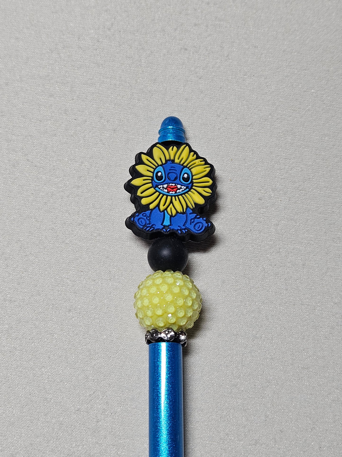 Beaded sunflower stitch blue metal pen